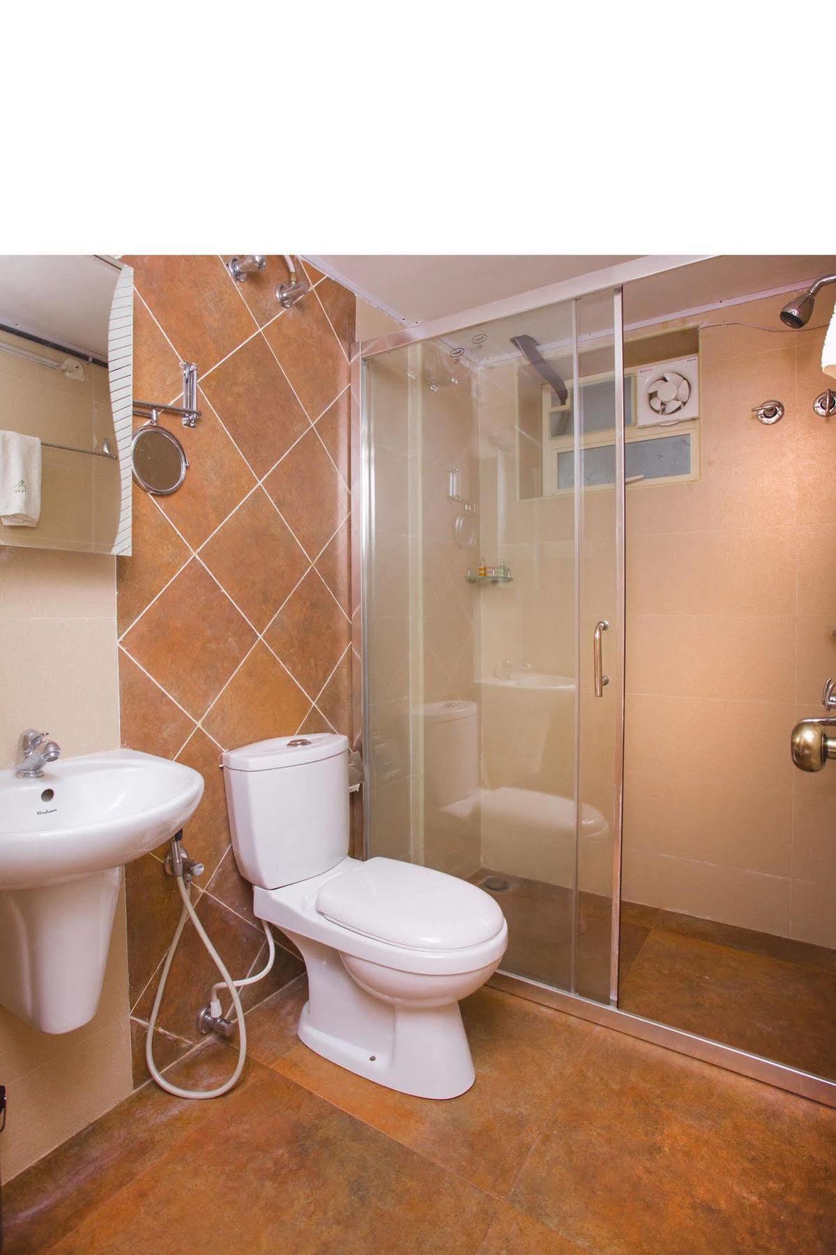 Atlas Airport Hotel Apartment Недумбассери Экстерьер фото